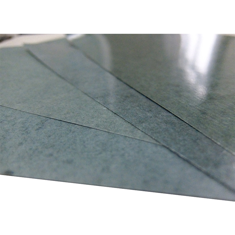 How does the multilayer structure of composite paper practically enhance its insulation performance?